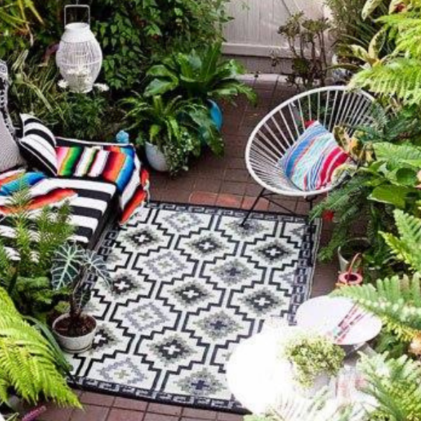 Lhasa Black and Cream Moroccan Recycled Plastic Outdoor Area Rug - Area rugs Fab Habitat