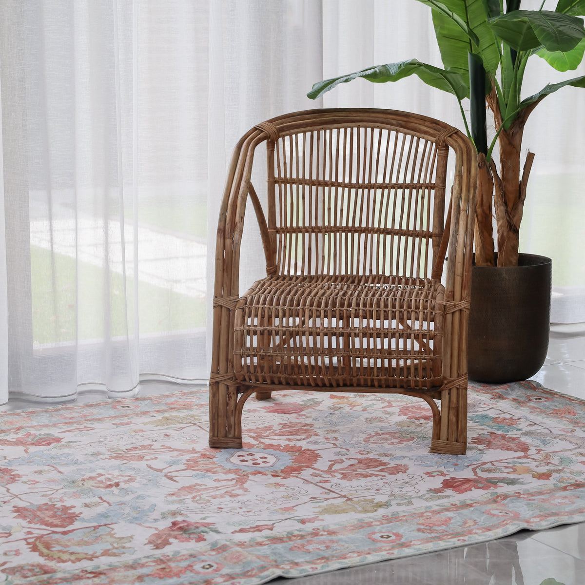 Side view of handcrafted cane armchair – comfortable rattan seating, buy online in Australia