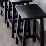Maya black stool angled view – smooth seat and sturdy legs, 45cm, buy online in Australia